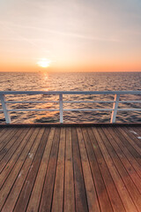 Fototapeta na wymiar sunset on the pier in Jurata
