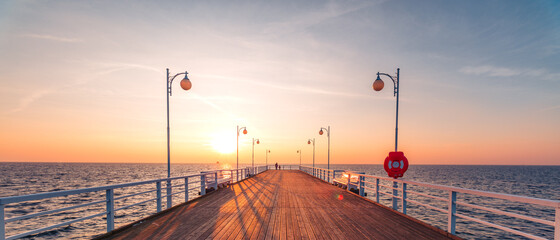 sunset on the pier in Jurata