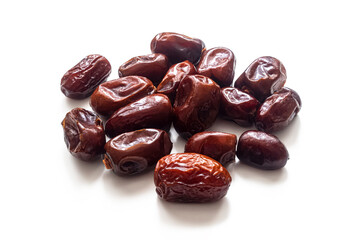 Dried dates on a white background
