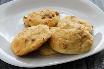 Dessert from cottage cheese with raisins. Cottage cheese pancakes baked in the oven.