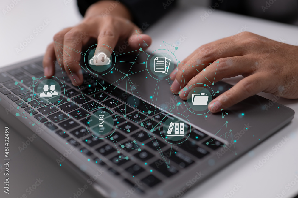Aufkleber Businessman is using a computer to think about document management, an online documentation database, digital file storage software, records keeping, database technology, file access, and docs.