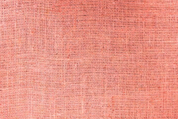 Red burlap with beautiful canvas texture of red fabric in retro style with beautiful red fabric canvas texture as vintage burlap background with burlap texture and beautiful burlap color