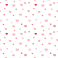 Seamless pattern with different hand-drawn red and pink romantic hearts