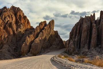 Driving through the famous Ruta 40 National Route, winding through the arrow-like geological marvels of the Quebrada de Las Flechas, Valles Calchaquíes, Salta, Northwest Argentina