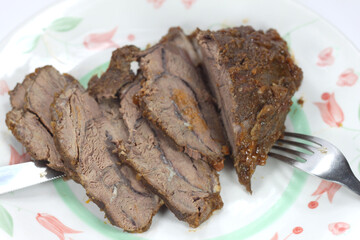 cut of meat pork cheek with red wine
