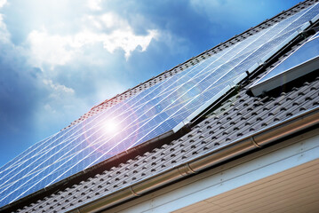 Roof with solar photovoltaic panel fragment