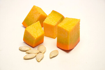 ripe pumpkin in cubes with seeds