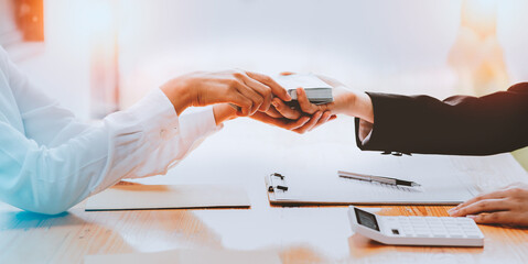 Corrupted, Close up of businesswoman hand giving money, corruption, Russian banknotes, to his partner on the table - loan, bribery and corruption concepts