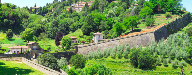 View of the gate of St. Lorenzo in Bergamo, Lombardy. Medieval city walls surrounding the Upper Town