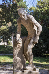 Statue in park (Jardin d'Ete), Arles, Provence, France