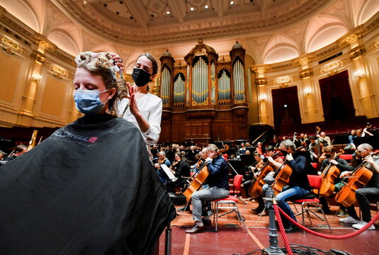 Museums and concert halls protest against government rules allowing gyms and hairdressers to re-open while they have to stay shut due to COVID-19 restrictions, in Amsterdam