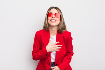 pretty young woman laughing out loud at some hilarious joke