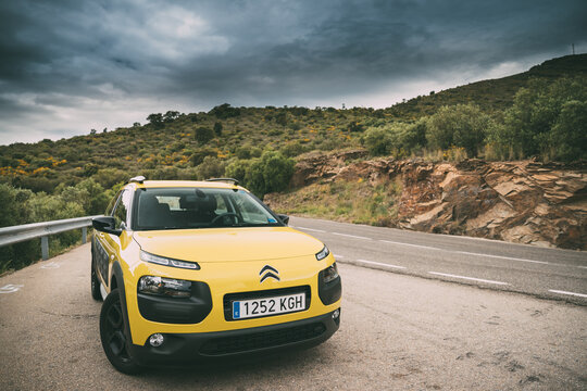 Citroen C4 Cactus Car Parked On Background Of Spanish Mountain Nature Landscape. The Citroen C4 Cactus Is A Mini Crossover, Produced By French Automaker Citroen