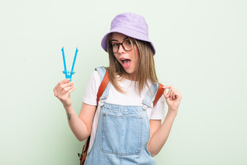 pretty young woman looking arrogant, successful, positive and proud. student concept