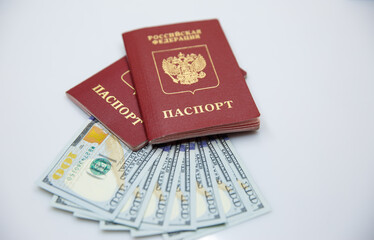 two Russian passports and one hundred dollar bills