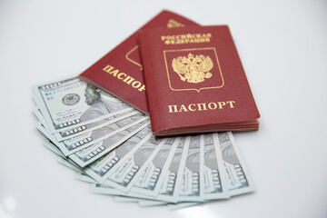 two Russian passports and one hundred dollar bills