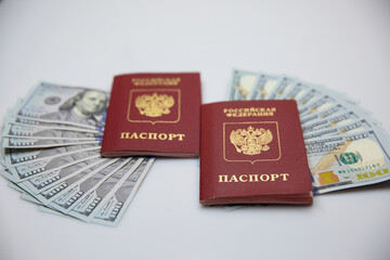 two Russian passports and one hundred dollar bills