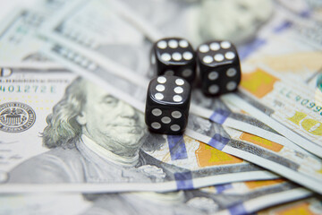 dollars with playing bones