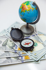 globe dollars and compass