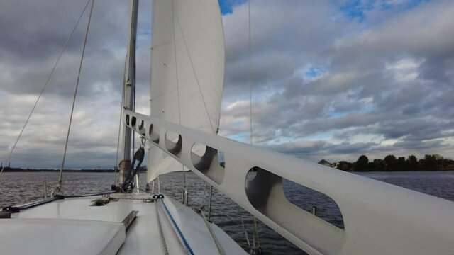 Close-up, element of a sailing yacht. Yacht trip. White yacht under sail.