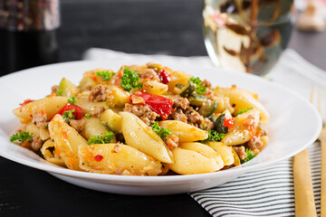 Conchiglie pasta. Italian pasta shells with minced meat, zucchini, tomato and sweet peppers.