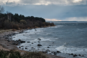 dark clouds on a windy beach shore coast