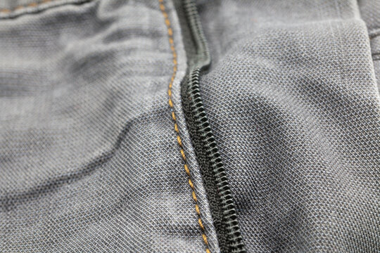 black denim fabric and zipper, textile industry