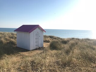 Fototapeta na wymiar beach hut on the beach