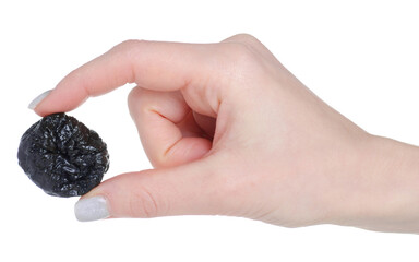 prunes dried fruit in hand on white background isolation