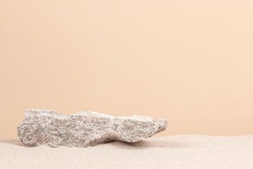 Grungy grey concrete stone platform podium for cosmetics or products on white beach sand...