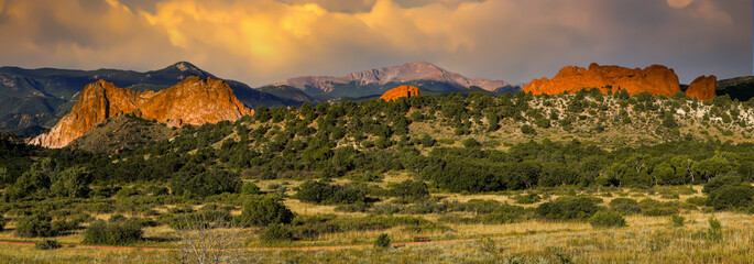 A panorama view of Garden of the gods rock formations with threatening clouds, near Colorado...