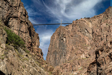 The royal gorge suspension bridge viewed from the bottom of the Animas river gorge along the Durango silverton railroad line, Colorado - obrazy, fototapety, plakaty
