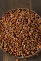 buckwheat on brown wooden surface