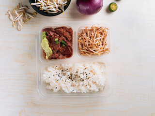Traditional Arabic rice with Sliced Lamb Set served in bowl on grey background top view