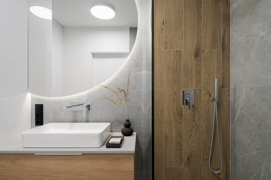 Modern bathroom with wooden style tiles
