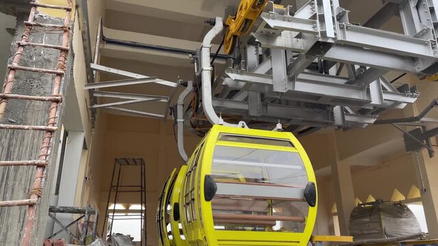 Building ropeway trolley in the hills of India.