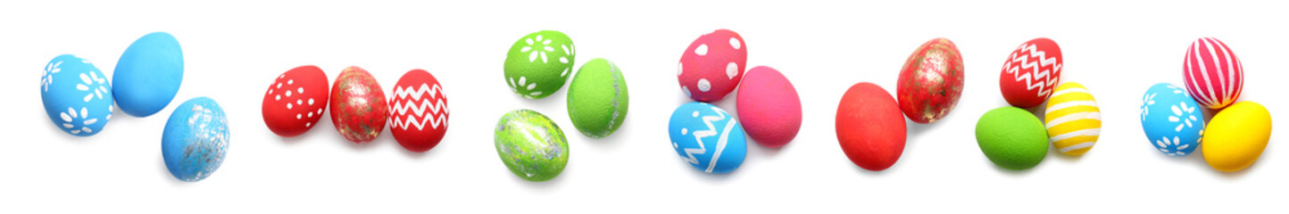 Beautiful Easter eggs on white background, top view