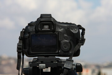 digital camera on tripod