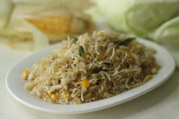 Cabbage corn fried rice. A tasty rice dish with sauteed cabbage and corn flavoured with garlic.