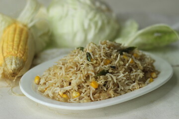 Cabbage corn fried rice. A tasty rice dish with sauteed cabbage and corn flavoured with garlic.