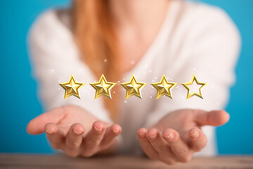 pointing five star symbol to increase rating of company