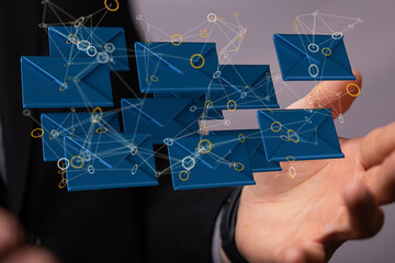 Hand holding using mobile phone with email icon on screen. Concept of business communication