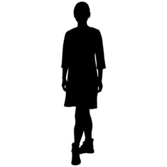 black silhouette of slender girl in short dress