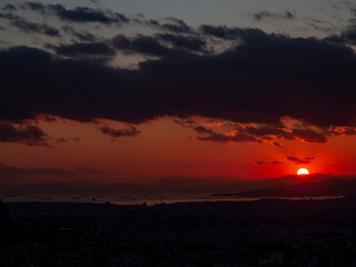 Sunset in Athens city in Greece a cold afternoon