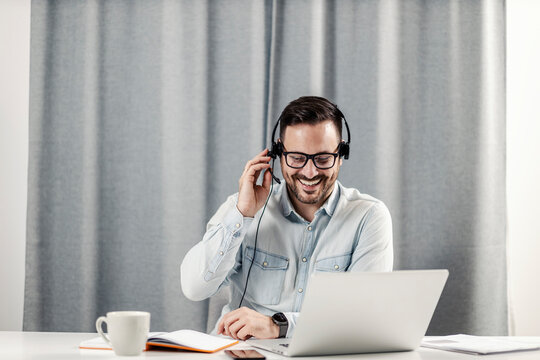 Male Technical Support Agent Working At Home.