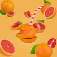 Whole and sliced grapefruit on pieces with straw for juice flying in air isolated on pastel pink background.