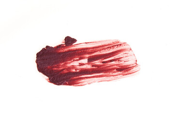 The smear and texture of lipstick. The pink color is highlighted on an isolated white background. An element for beauty cosmetic design. High quality photo