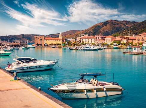 Sunny day on the Mediterraneanm coast of Italy. Captivating summer cityscape of Acciaroli town. Traveling concept background.