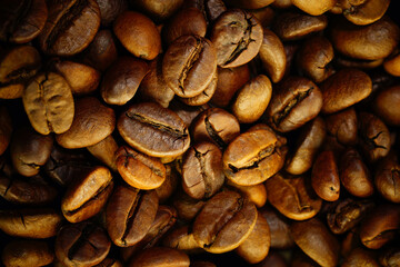 roasted coffee beans close uproasted coffee beans close up