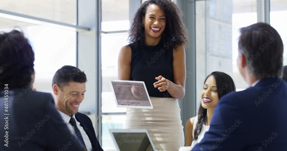 Poster it's clear for all to see. cropped shot of a businesswoman using a digital tablet while giving a pre